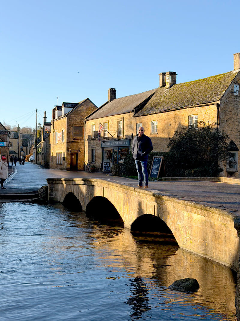Charlie on the stone bridges over the River Windrush in Bourton-on-the-Water, Cotswolds