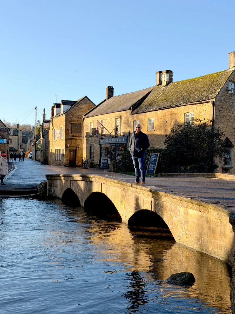 Charlie on the stone bridges over the River Windrush in Bourton-on-the-Water, Cotswolds