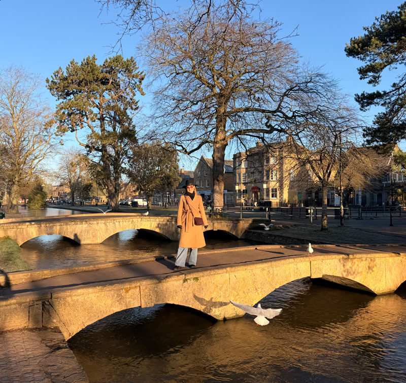 Pretty stone bridges over the River Windrush in Bourton-on-the-Water, Cotswolds