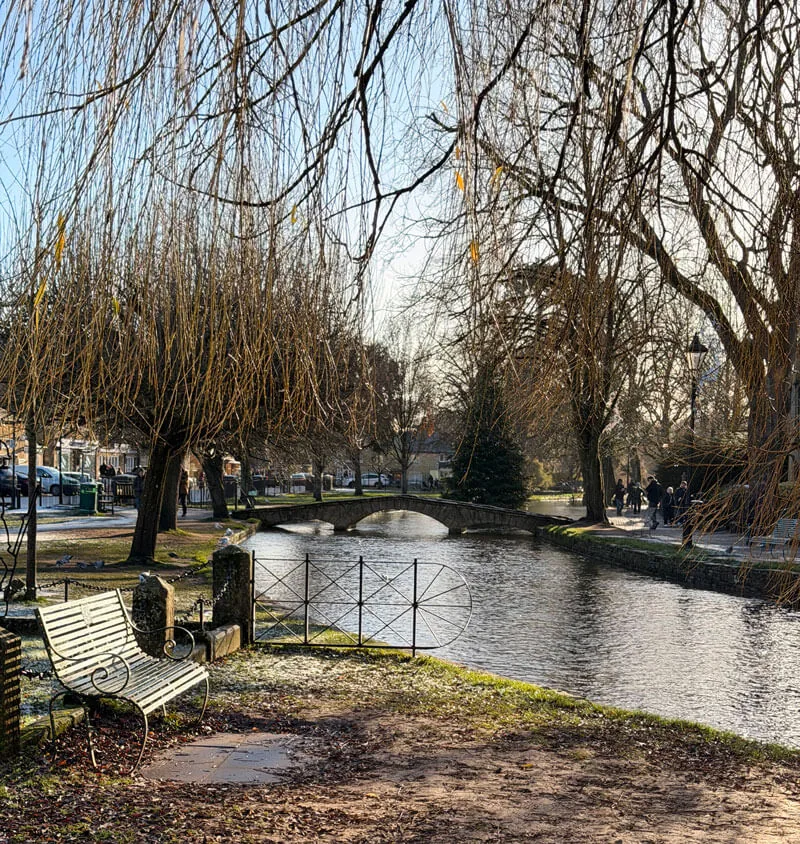 Bourton-on-the-Water village bridges reflected in the River Windrush, Cotswolds