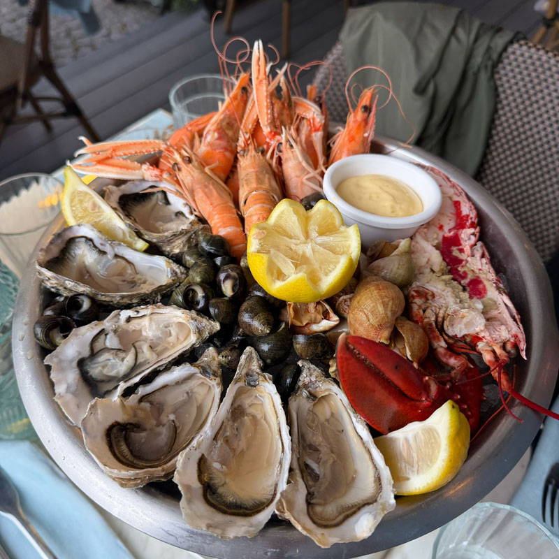 A seafood platter of lobster, langoustine and oysters on ice, Honfleur