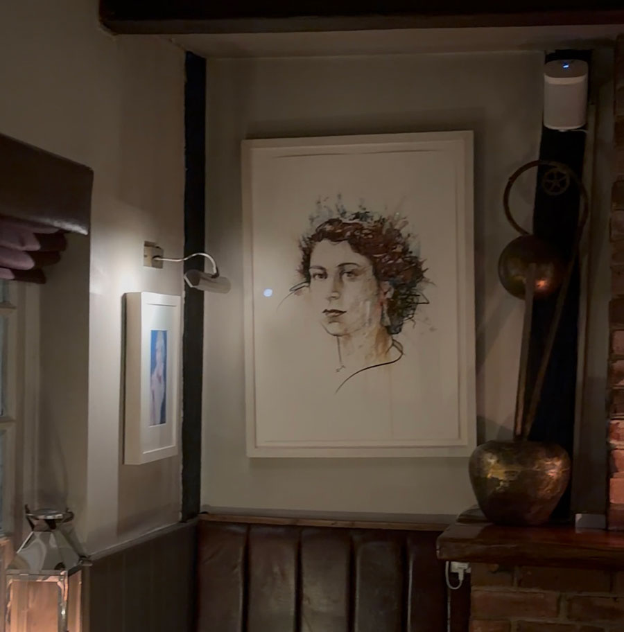 Artwork curated by Tom Kerridge's mum Eva on the walls of The Hand and Flowers dining room, Marlow