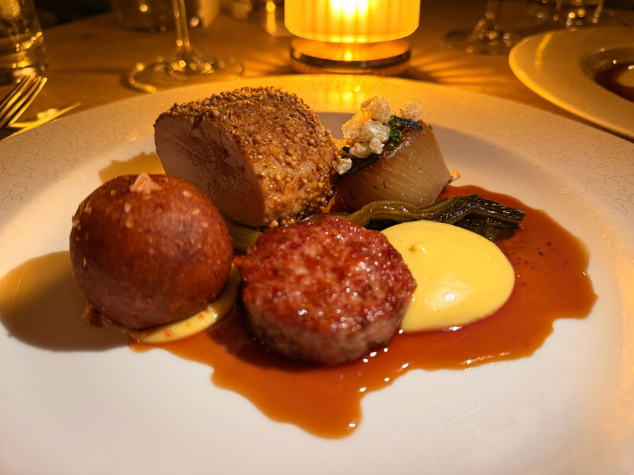 Tenderloin of Wiltshire pork with garlic sausage, pickled cabbage and mustard mayonnaise at The Hand and Flowers