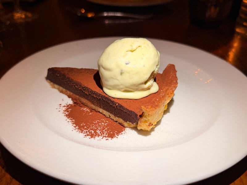 New Year's Eve dessert at the Old New Inn — pistachio ice cream with chocolate tart and champagne panna cotta