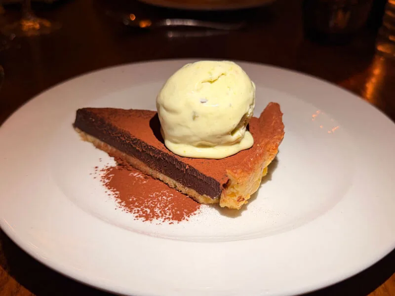 New Year's Eve dessert at the Old New Inn — pistachio ice cream with chocolate tart and champagne panna cotta
