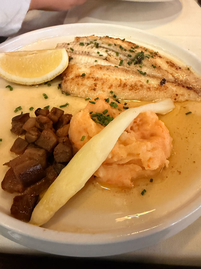 Lemon sole beautifully deboned and served with mash and asparagus at Perard, Le Touquet