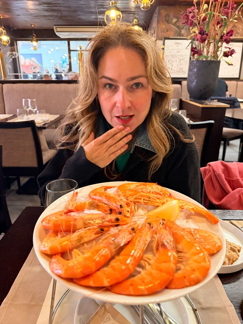 Starter of twelve garlic prawns with bread and butter at Perard seafood restaurant, Le Touquet