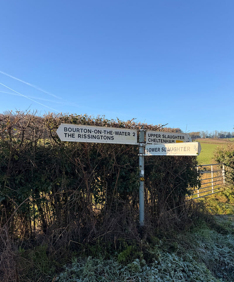 Footpath signs on the AllTrails walk through Lower Slaughter and Upper Slaughter from Bourton-on-the-Water