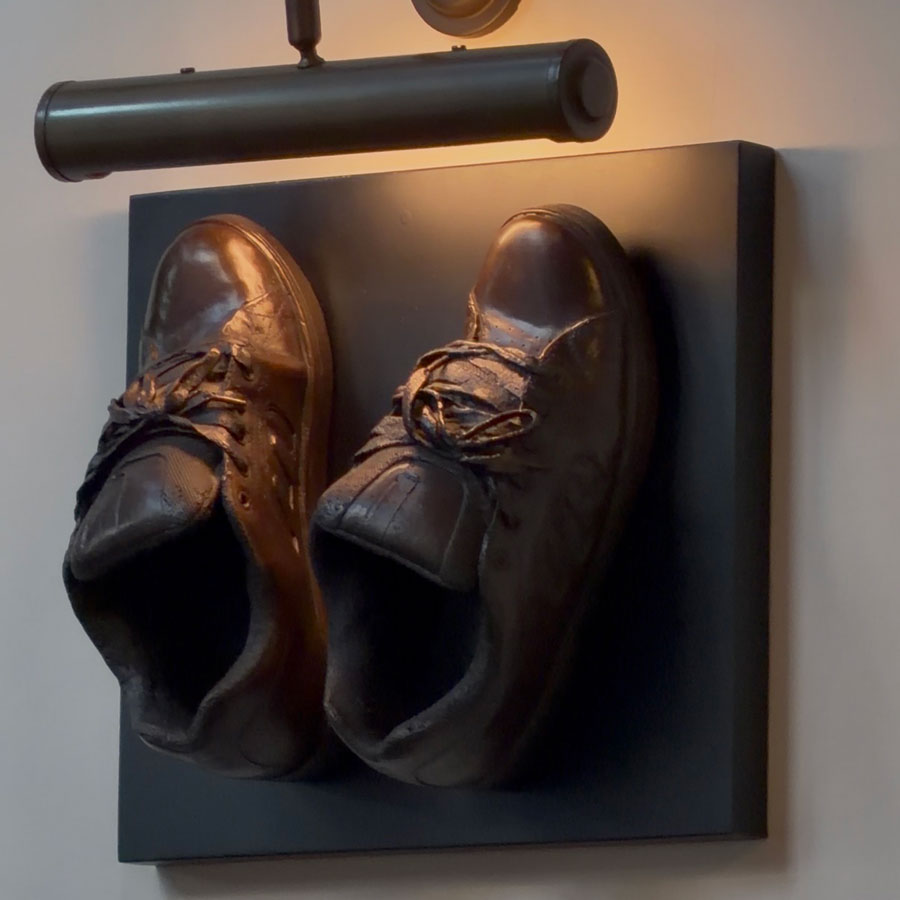 Tom Kerridge's early career shoes cast in iron, displayed at The Hand and Flowers, Marlow