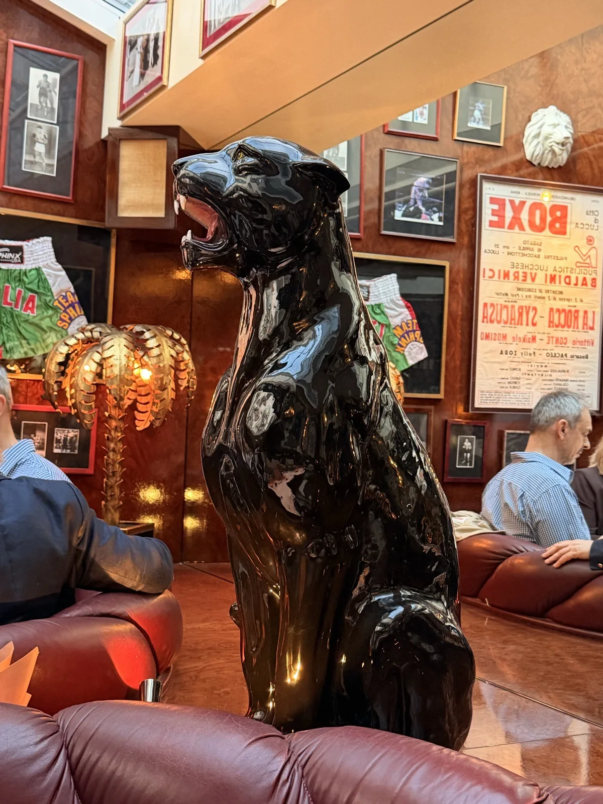 The enormous black ceramic panther beside the back table at Carlotta Marylebone