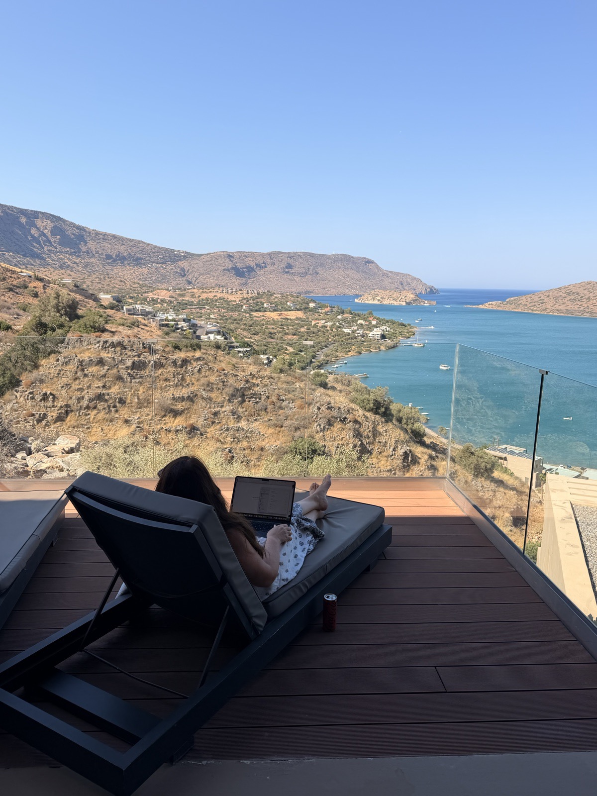 The terrace with its own pool and glass balustrade, and the panorama across Mirabello Bay that made us gasp