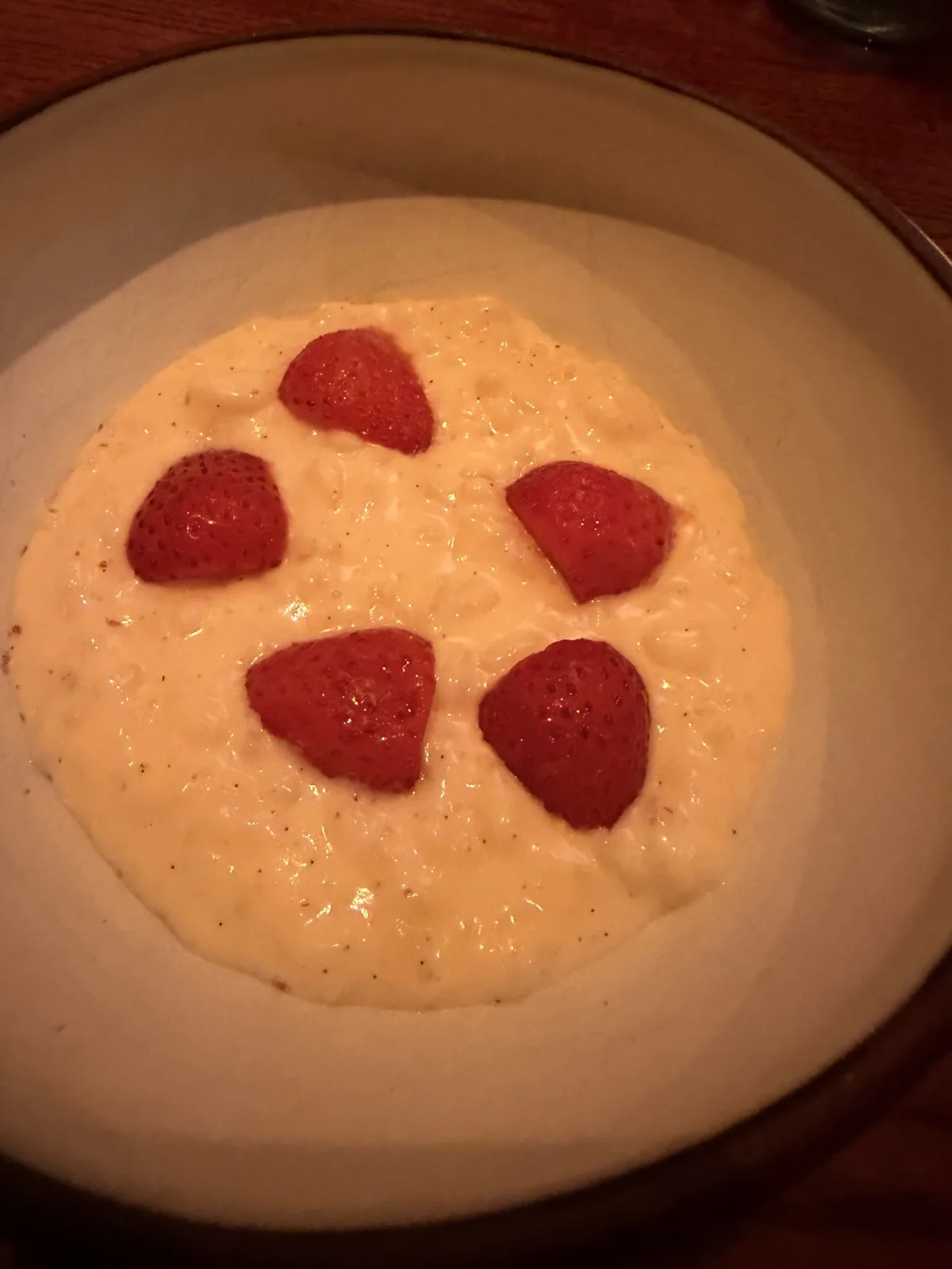 The strawberry and mezcal rice pudding at Fonda, creamy and vanilla heavy with fresh strawberries on top