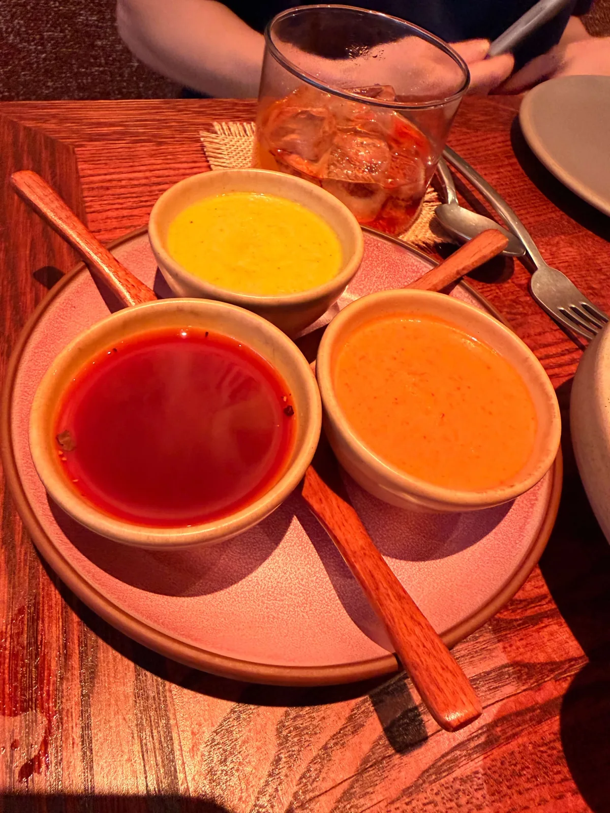 The three salsas served at Fonda Mayfair: scotch bonnet, jalapeño and a sweeter chilli, on a tray with the tortilla chips
