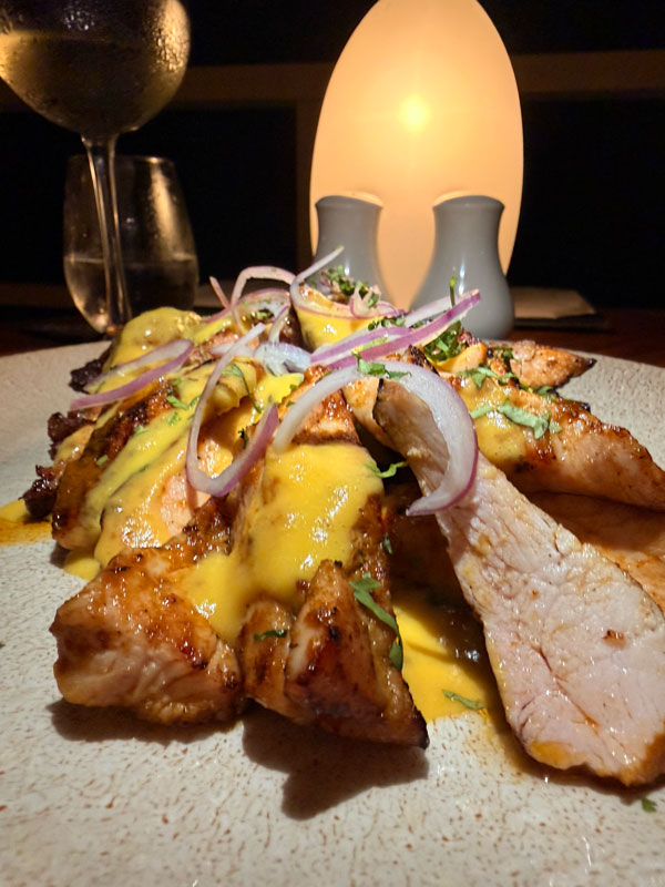 Half chicken cooked on the Josper grill at Baia Barbados, West Coast Barbados
