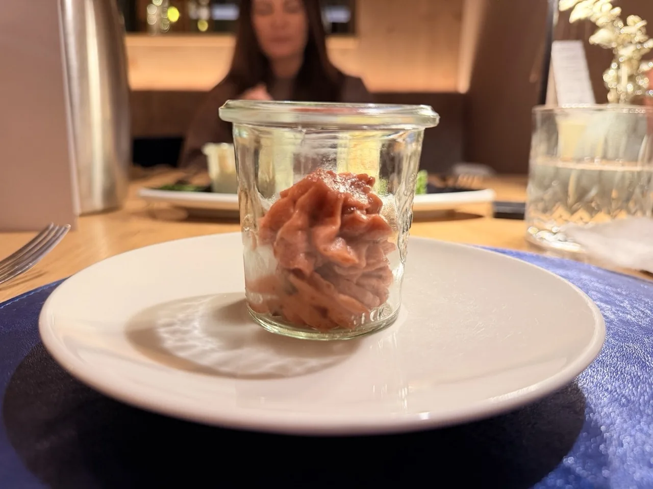 A course from the Hotel Kristall Christmas Eve tasting menu served in a small glass jar