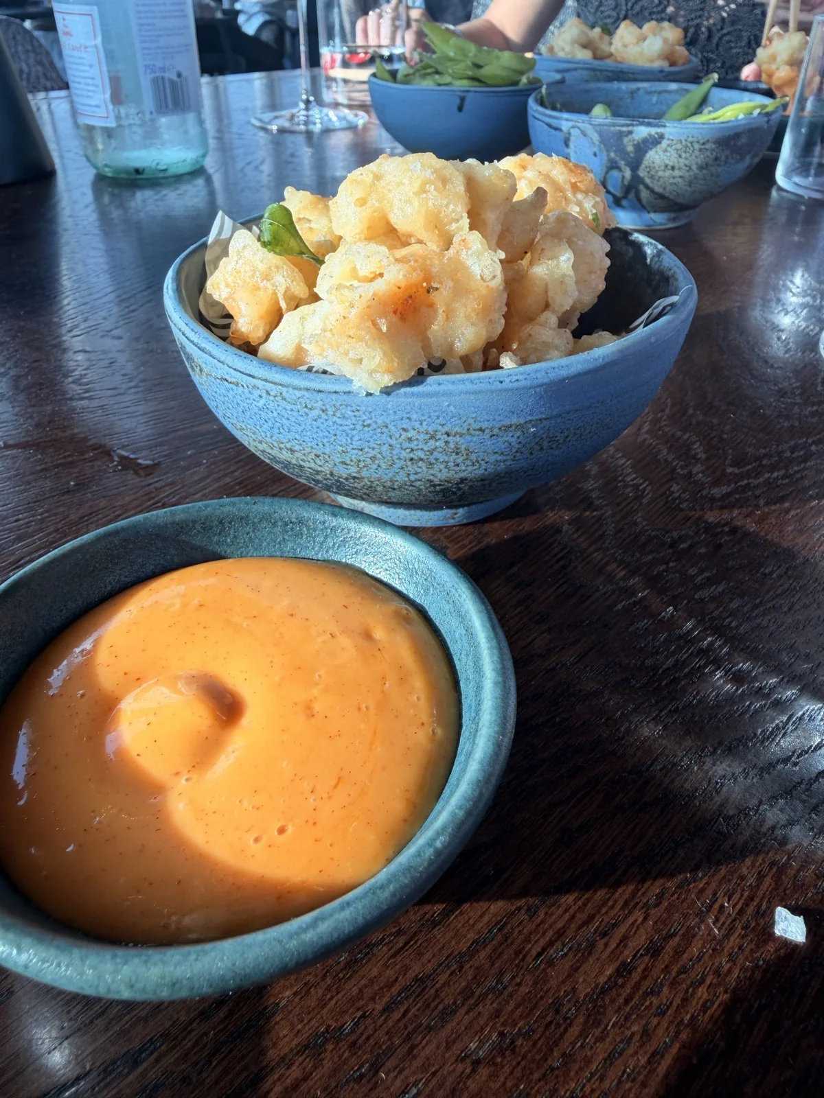 Cauliflower tempura with smoked kimchi mayonnaise and crispy curry leaves at Lucky Cat London