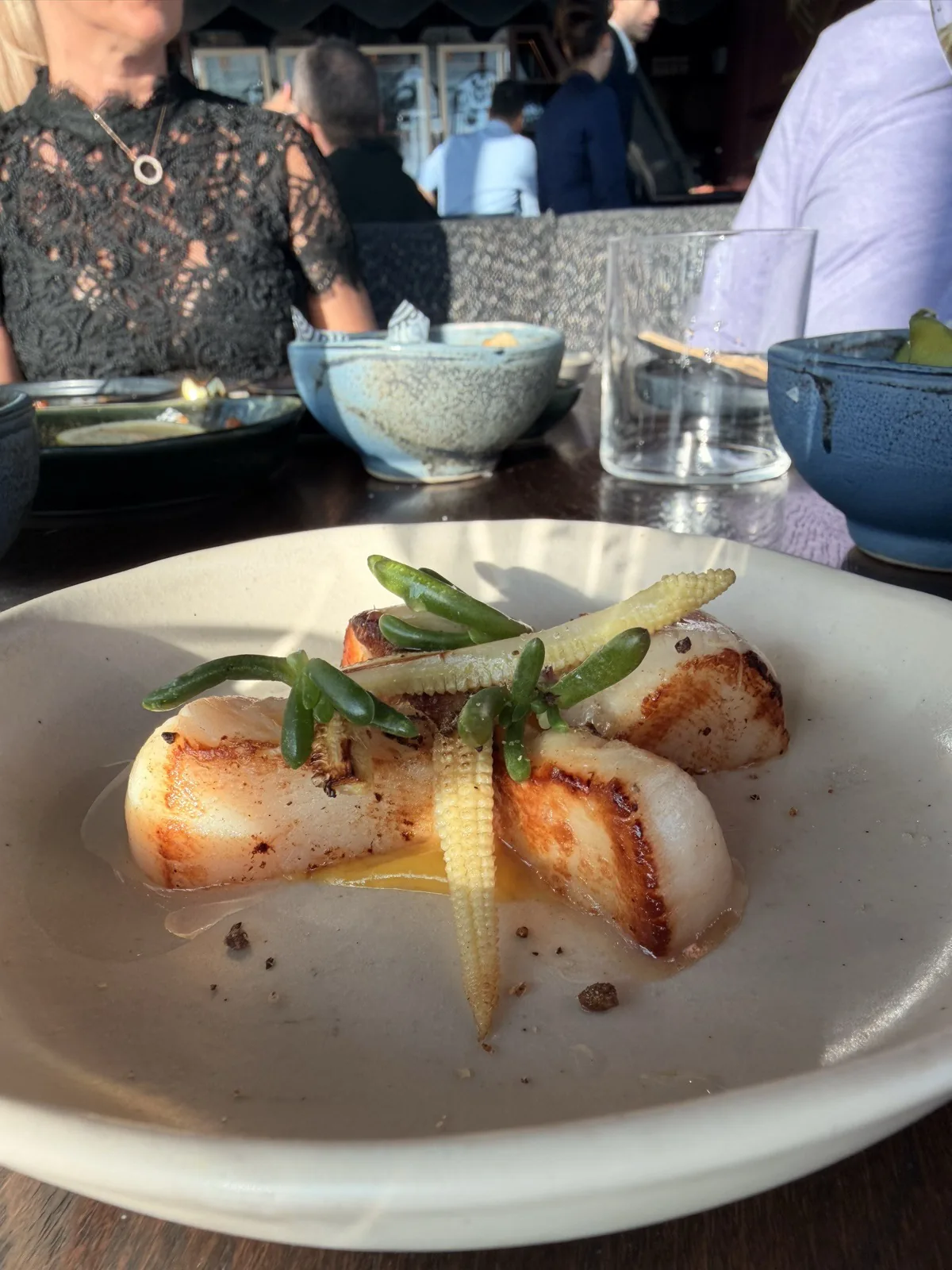 Scallops with yuzu and sweetcorn from the Signature menu at Lucky Cat London
