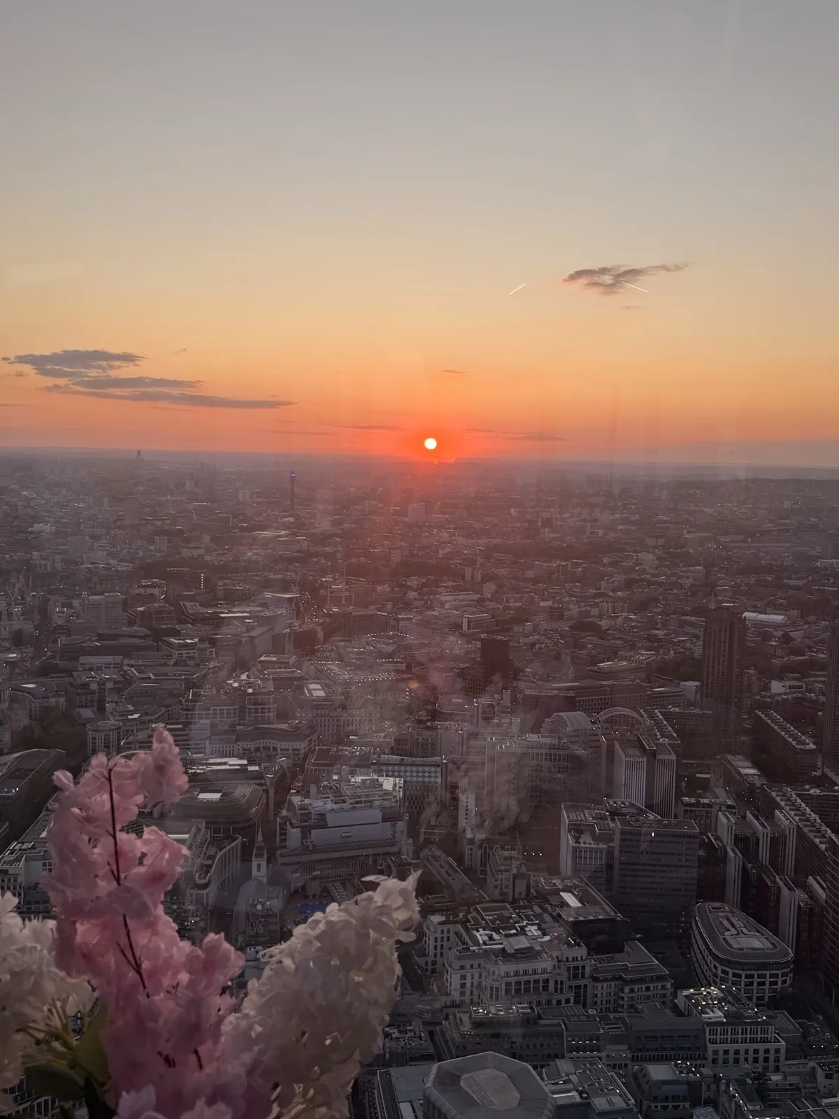 Sunset over London from the Lucky Cat Terrace, the whole city turning gold and then pink