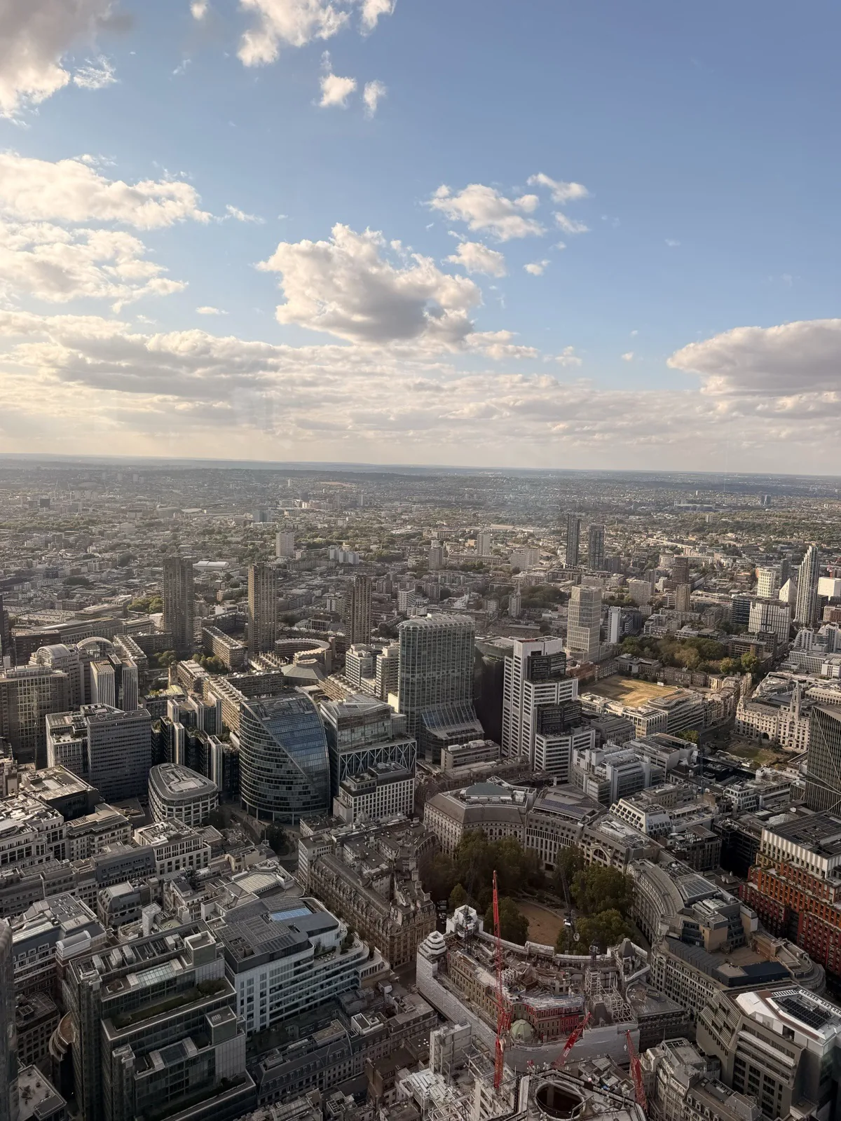 The view over the City of London from Level 60 of 22 Bishopsgate, with the Gherkin almost at eye level