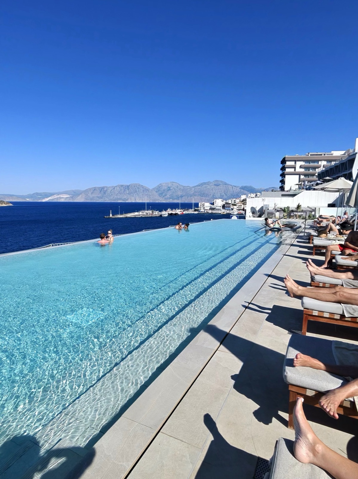 The main infinity pool at NIKO Seaside Resort, very beautiful and, as a direct result, very busy