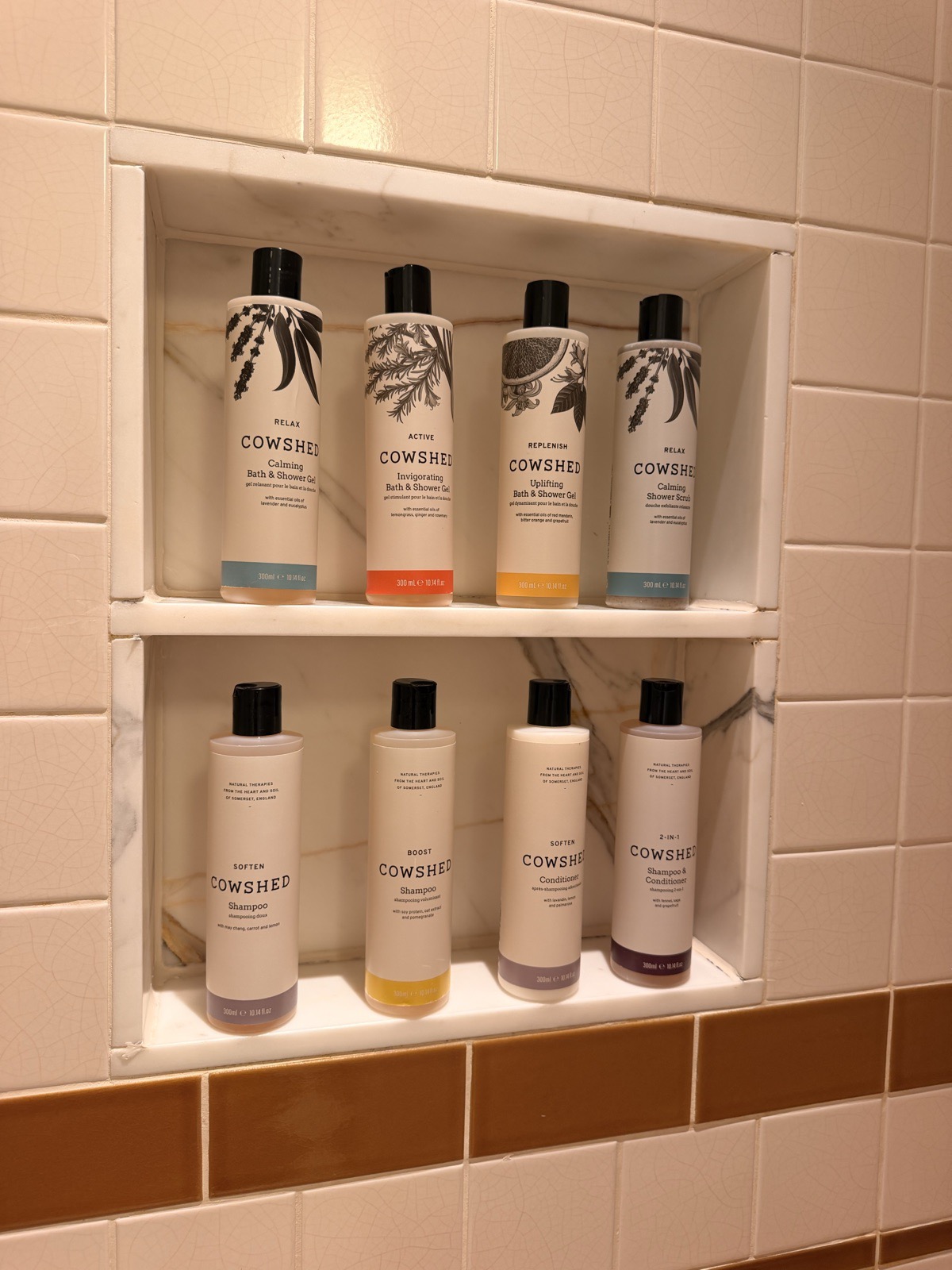 A choice of Cowshed body washes, scrubs, shampoos and conditioners in the shower at The Ned