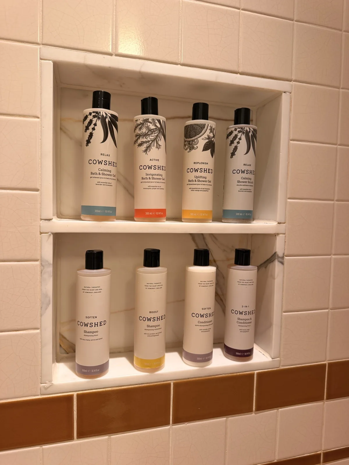 A choice of Cowshed body washes, scrubs, shampoos and conditioners in the shower at The Ned
