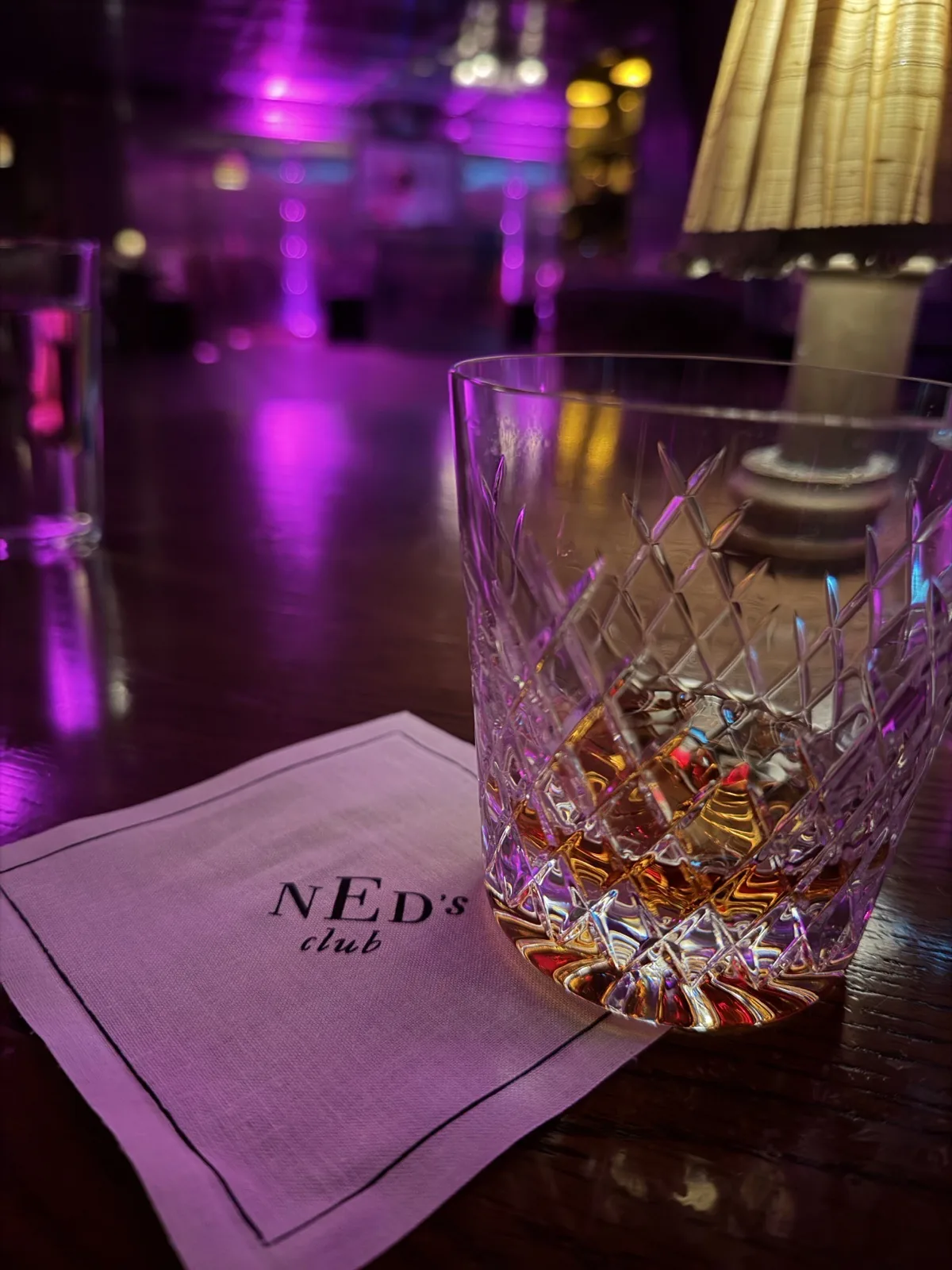 A neat Diplomatico rum on a Ned's Club napkin in the Vault bar