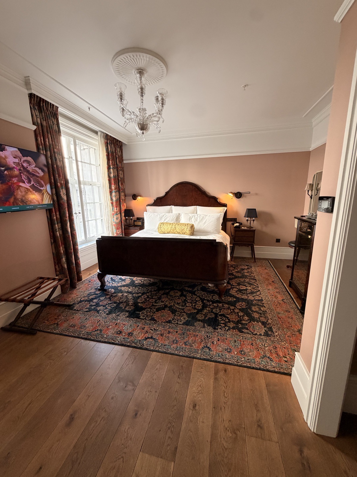 Medium room at The Ned London with a king size bed, Twenties styling and a chandelier