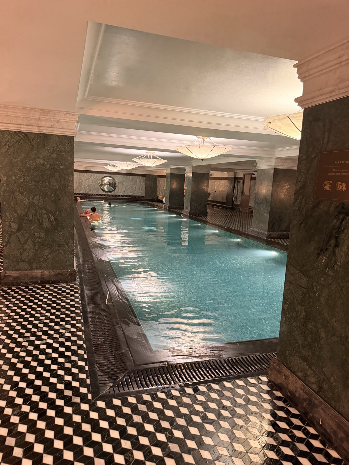 Ned's Club Spa at The Ned, with its twenty metre indoor pool and chequerboard tiling