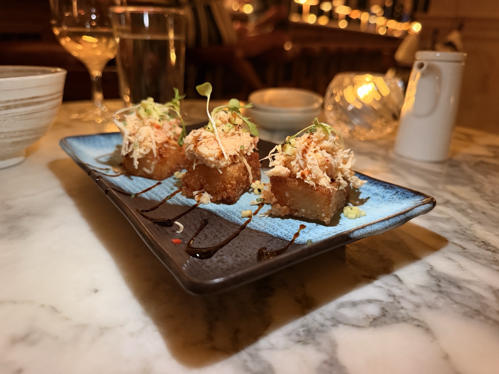 Snow crab bites on crispy rice with wasabi tobiko at Kaia, The Ned's Asian Pacific restaurant