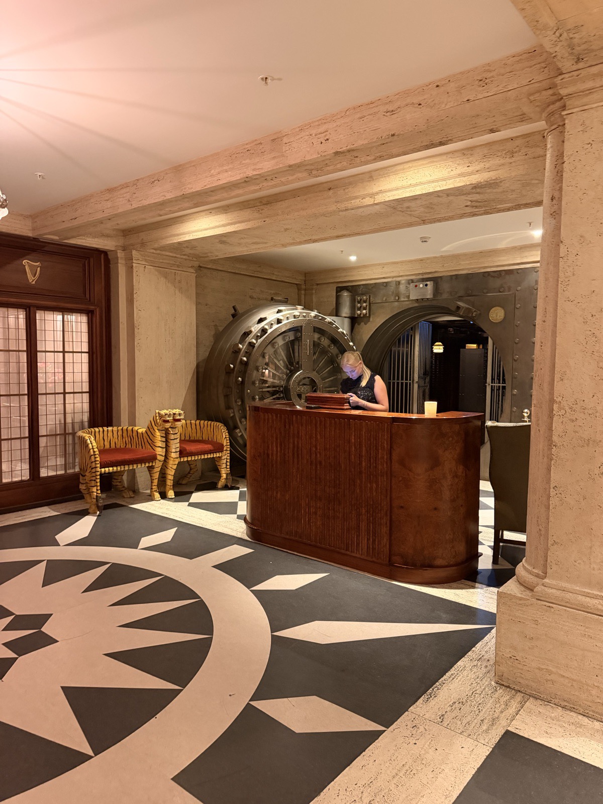 The original twenty tonne Midland Bank safe door at the entrance to the Vault bar at The Ned